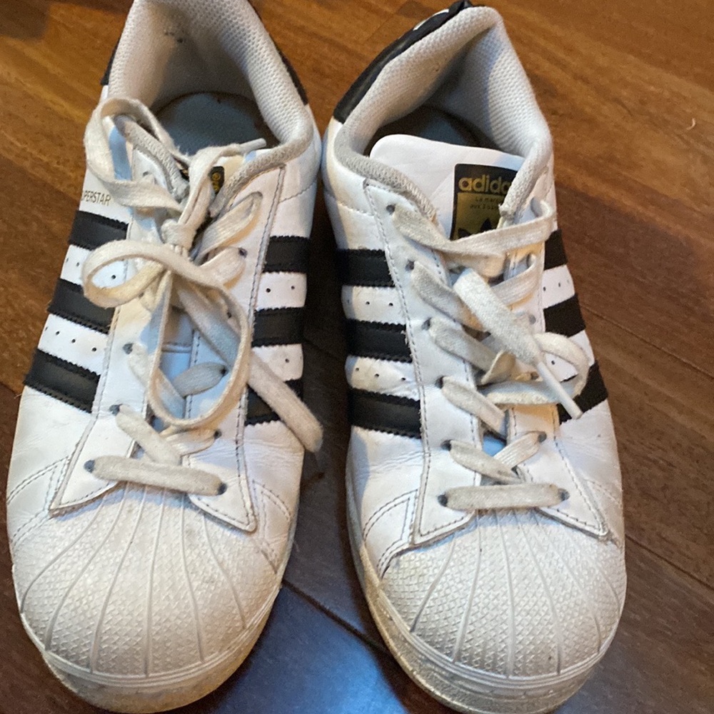 Lot of women’s boots & shoes UGG, Adidas & more. size 7, uses